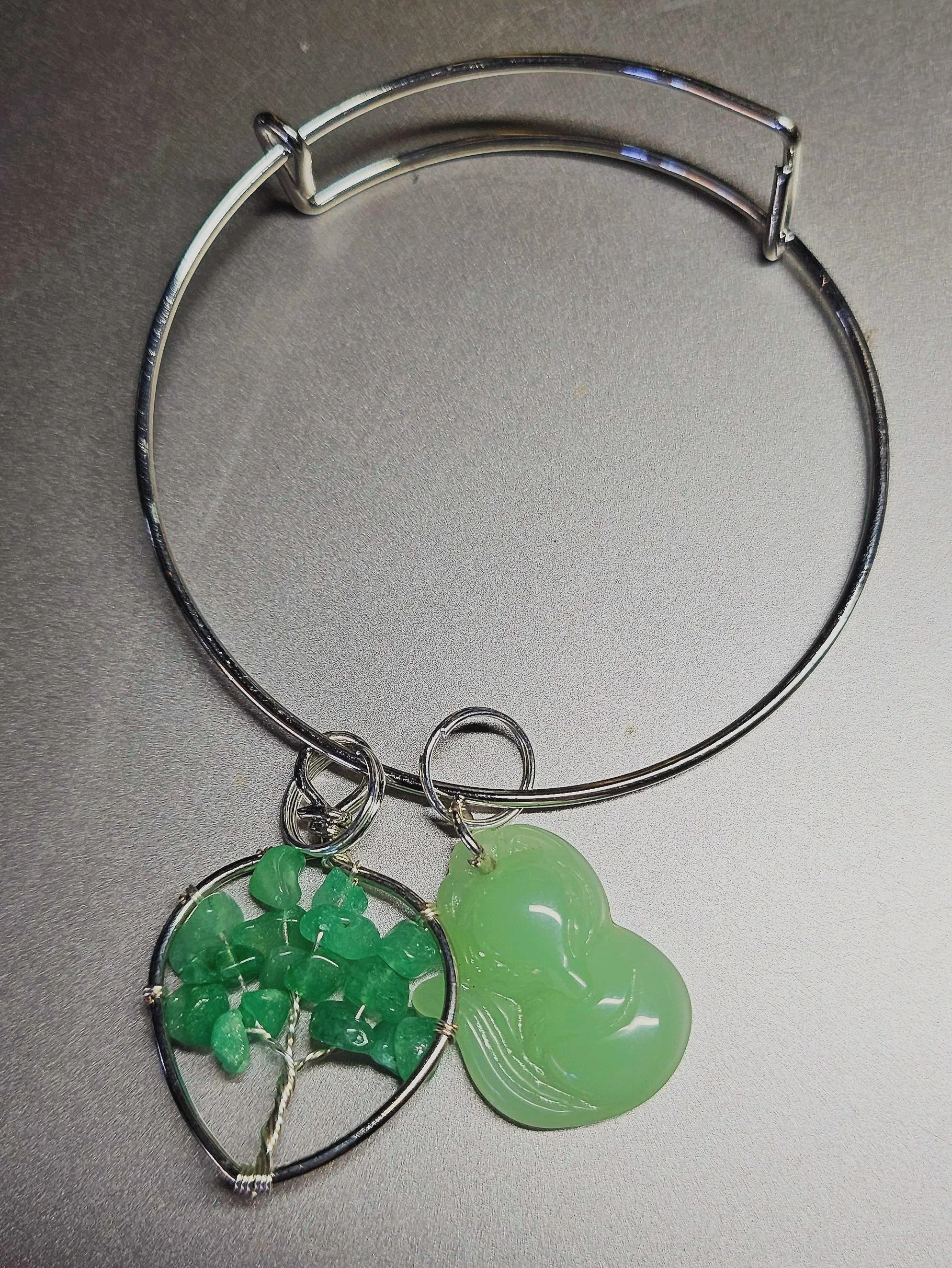 Silver bracelet with charms