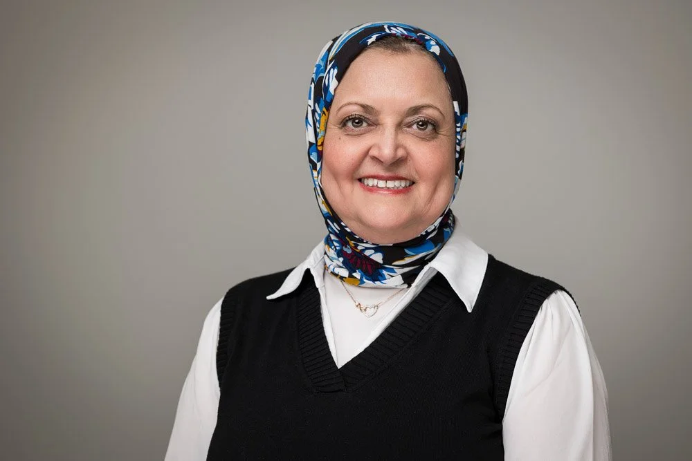 professional woman wearing hijab posing for business headshot