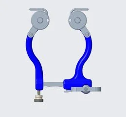 A pair of blue and gray motorcycle foot pegs with mounting brackets.
