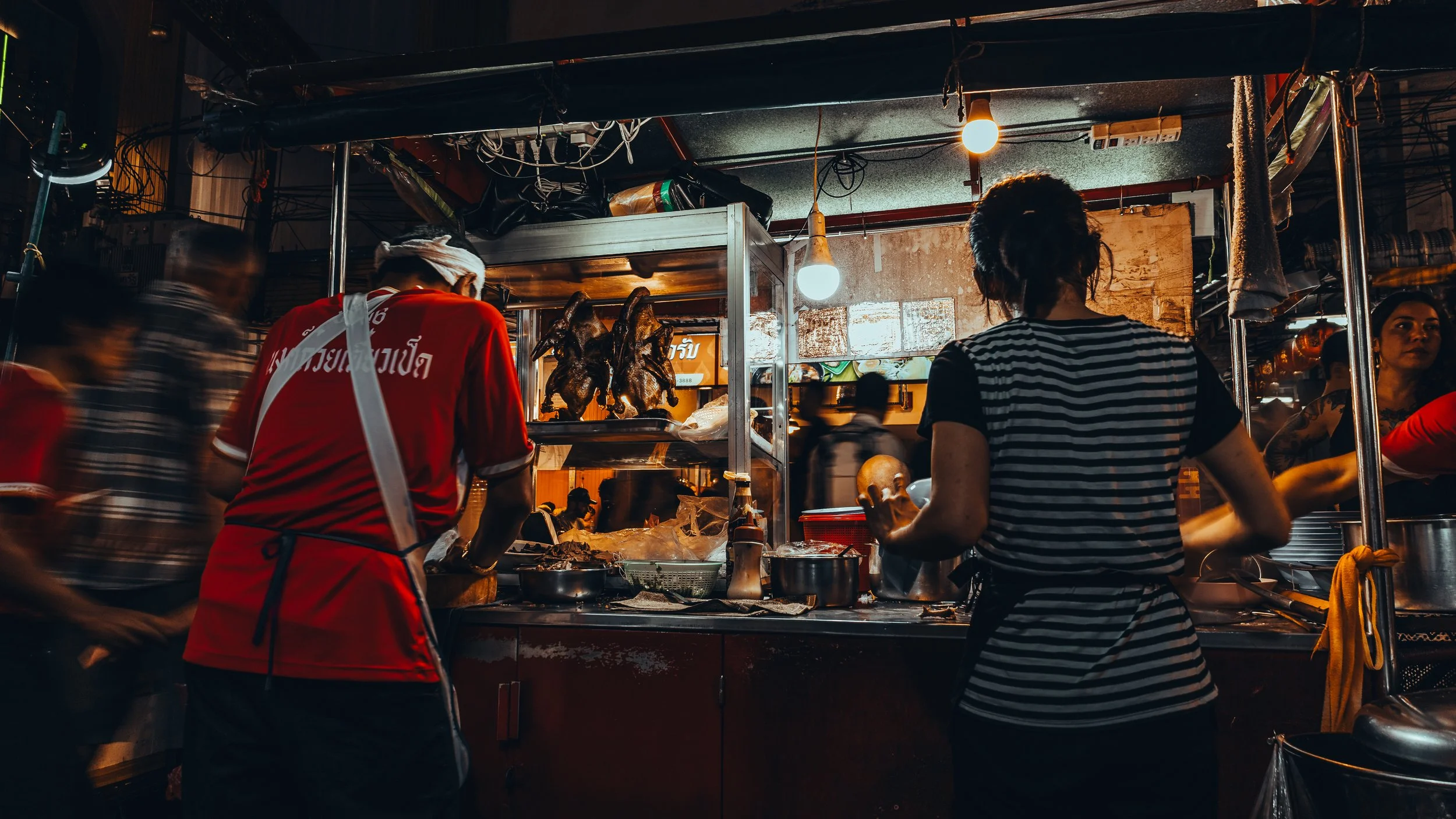 B&W street photography of thai stall food workers