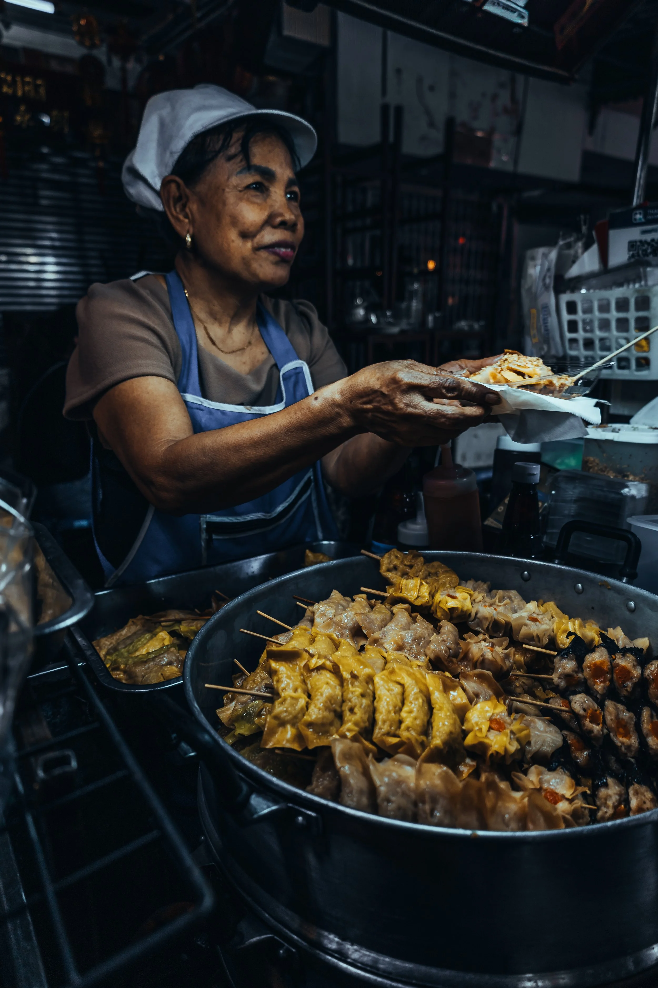 B&W street photography of thai stall food workers