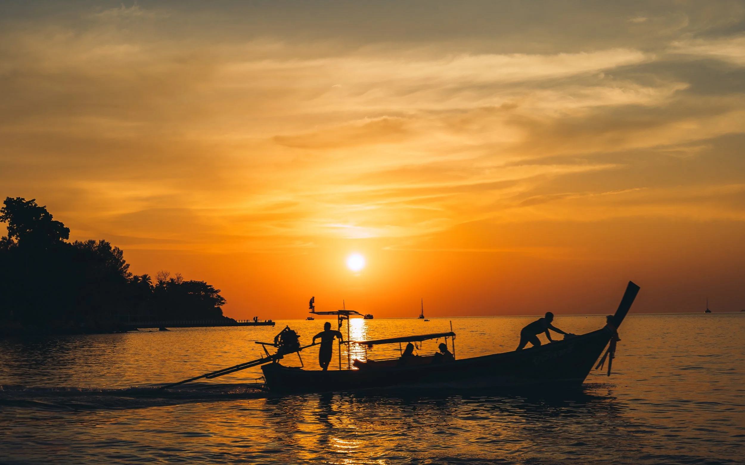 Sunset with long tail boat, Koh Lipe