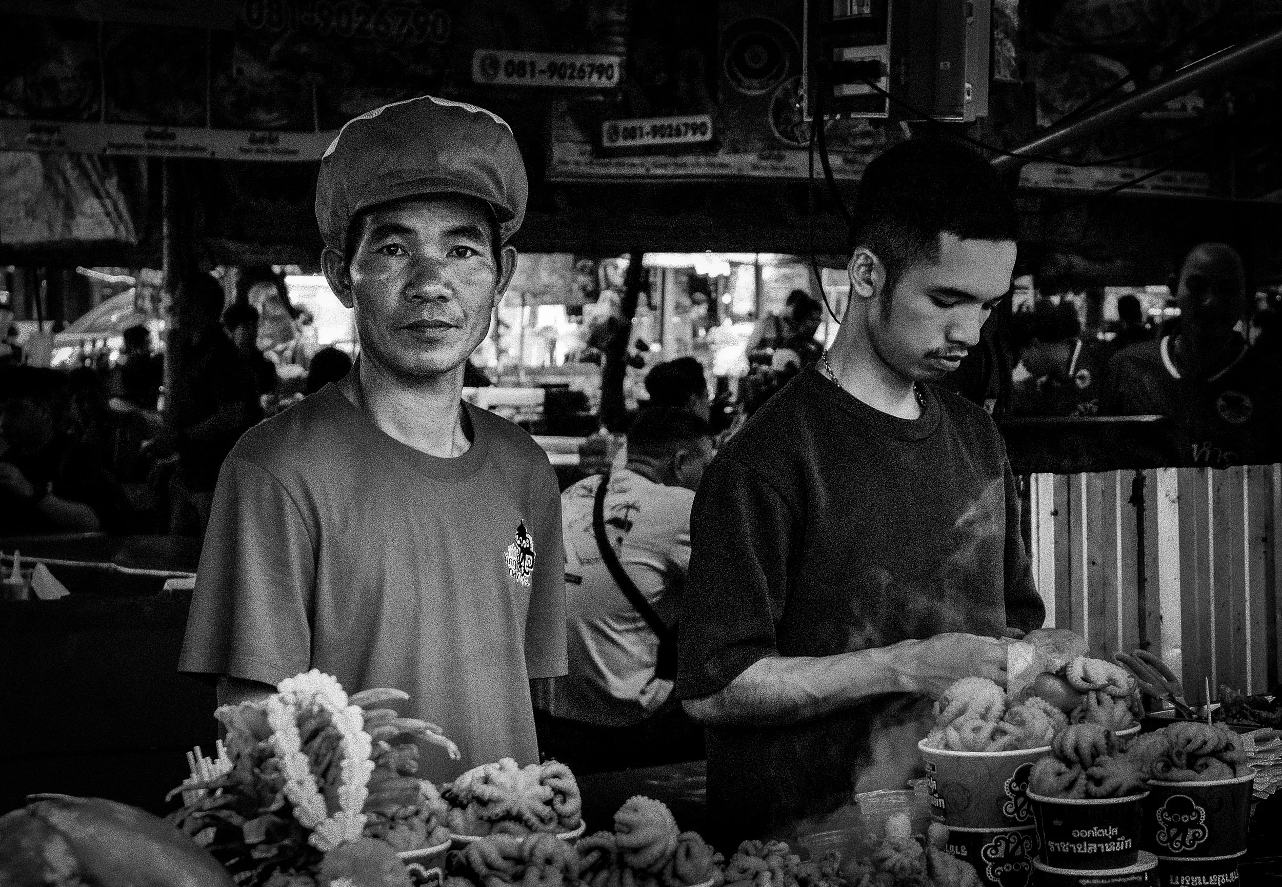 B&W street photography of thai stall food workers