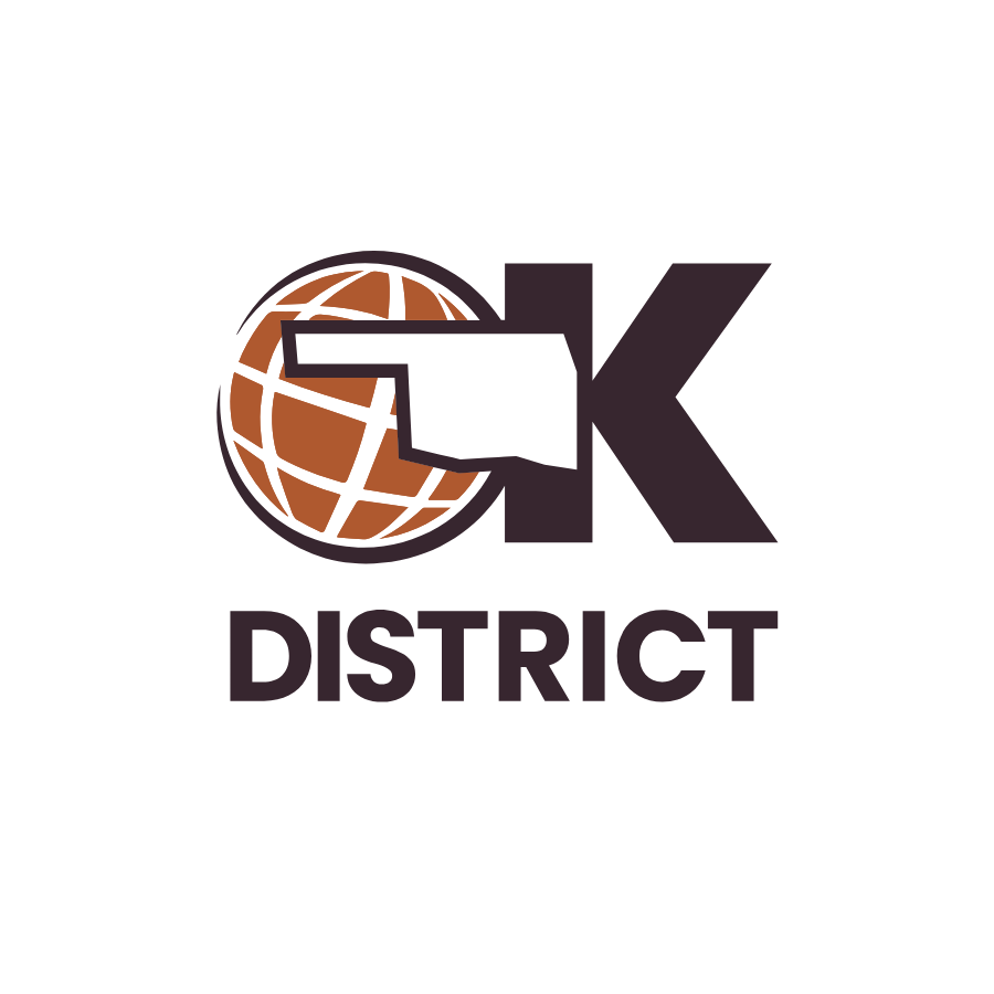 Logo with a stylized globe held by a hand, with the text 'OK District' beneath it.