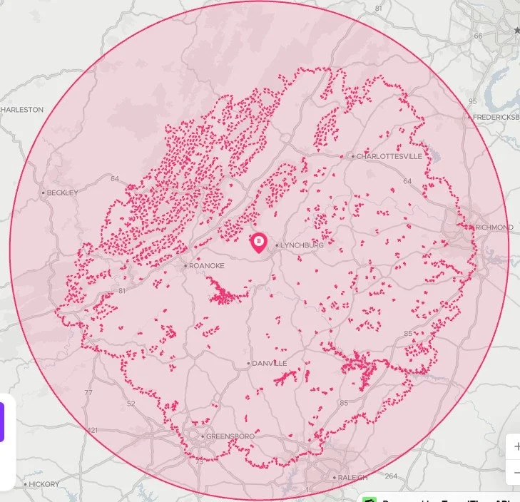 Map showing a tornado warning area outlined in pink, with a radar-echo pattern indicating storm activity, centered near Lynchburg, Virginia.