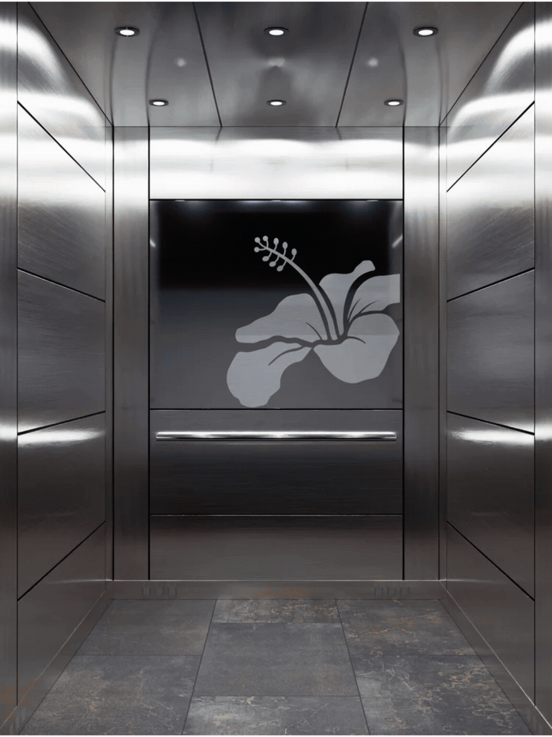 Ascensor con puertas metálicas y una rosa en la pantalla del interior.