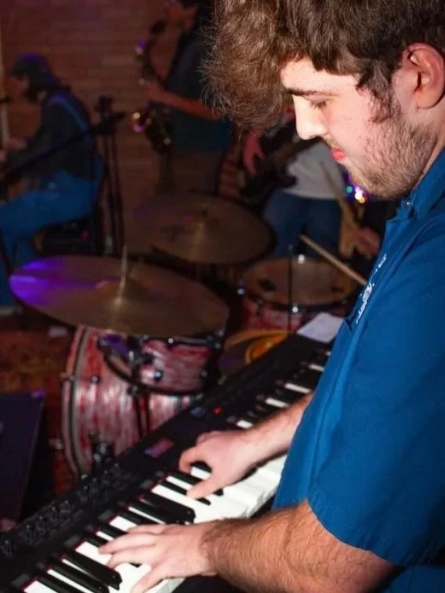 Cole Chaney playing the keyboard at a Tabasco Birds house show (Sep 2025). Photo credit to Jackson Holmes. | Denton's premiere cosmic country band. 'Cosmic American Music' available on all streaming platforms. LPs/CDs. Flying since 2024!