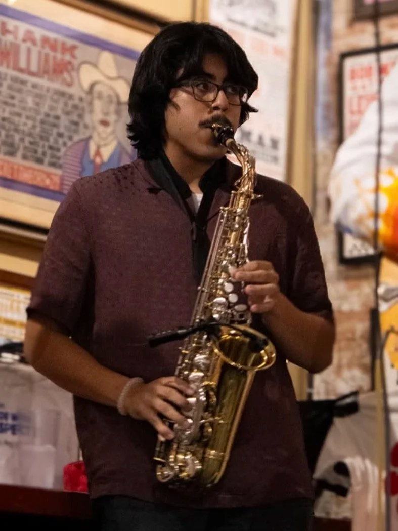 Joel Mena playing alto saxophone during gig at AllGood Cafe, Dallas (2025). | The Tabasco Birds, Denton's premiere cosmic country band. 'Cosmic American Music' available on all streaming platforms. LPs/CDs. Flying since 2024!