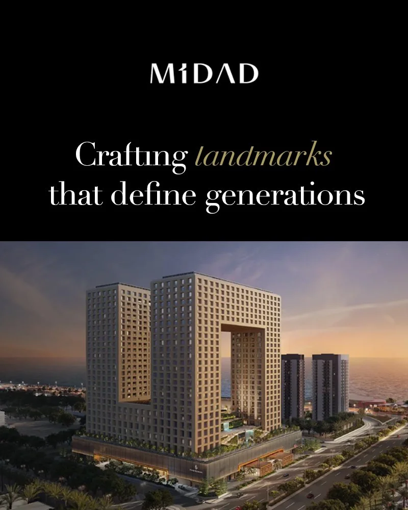 A digital rendering of a large modern building complex with connected towers and open architectural design, set against a sunset sky.