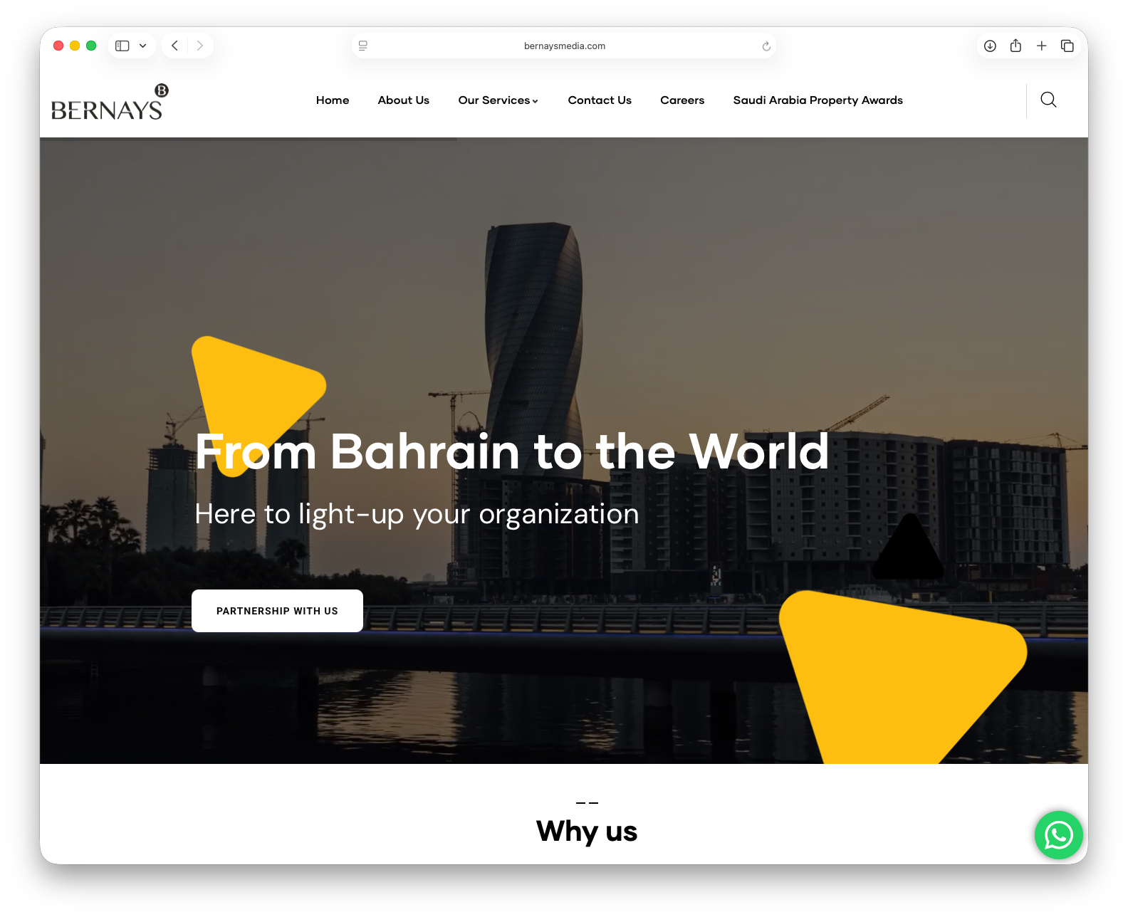 A website homepage for Bernays, a company based in Bahrain. The page features a cityscape with high-rise buildings and construction cranes at sunset, with an overlay of colorful geometric shapes and text that reads "From Bahrain to the World" and "Here to light-up your organization."