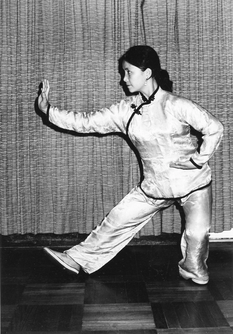 Bow Sim Mark demonstrating Chinese martial arts in an early performance photograph.