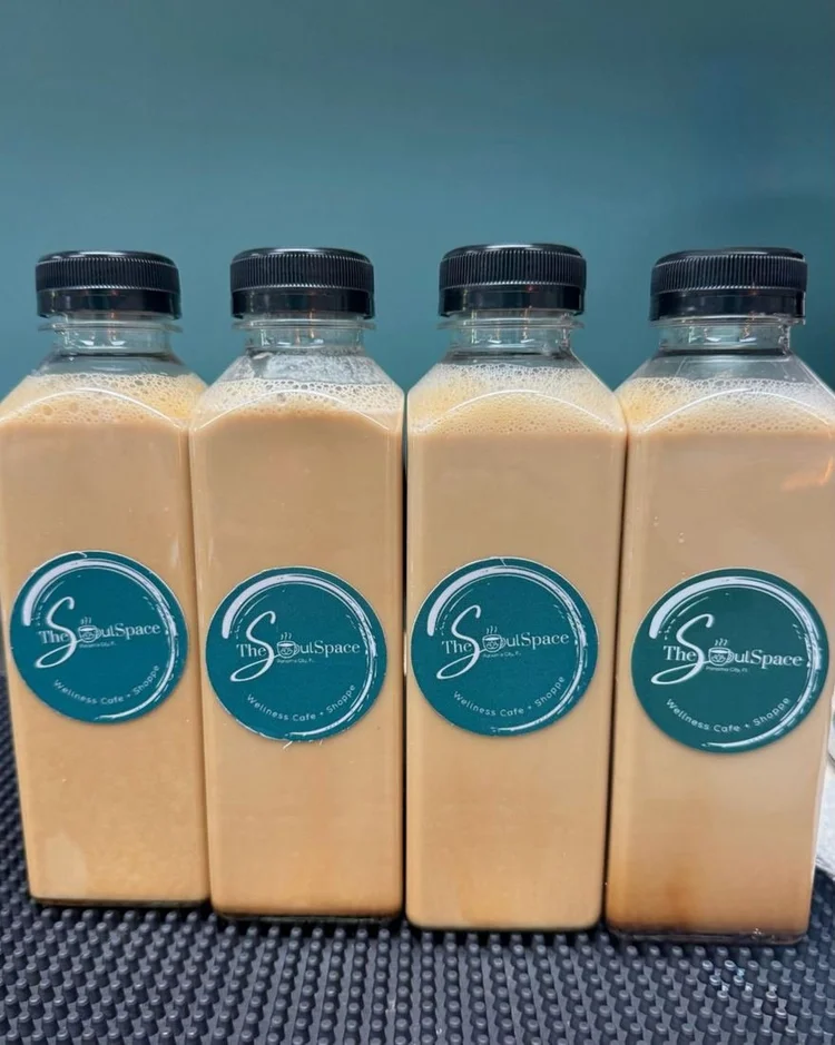 Bottled lattes with The Soul Space label, ready to grab in Panama City, FL