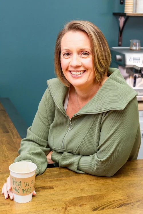 Owner Nicole enjoying a coffee at The Soul Space