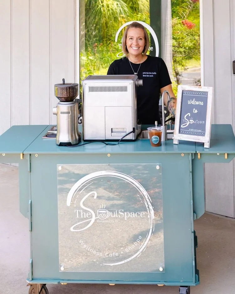 Nicole Mayo behind The Soul Space mobile coffee cart, available for events in Panama City, FL