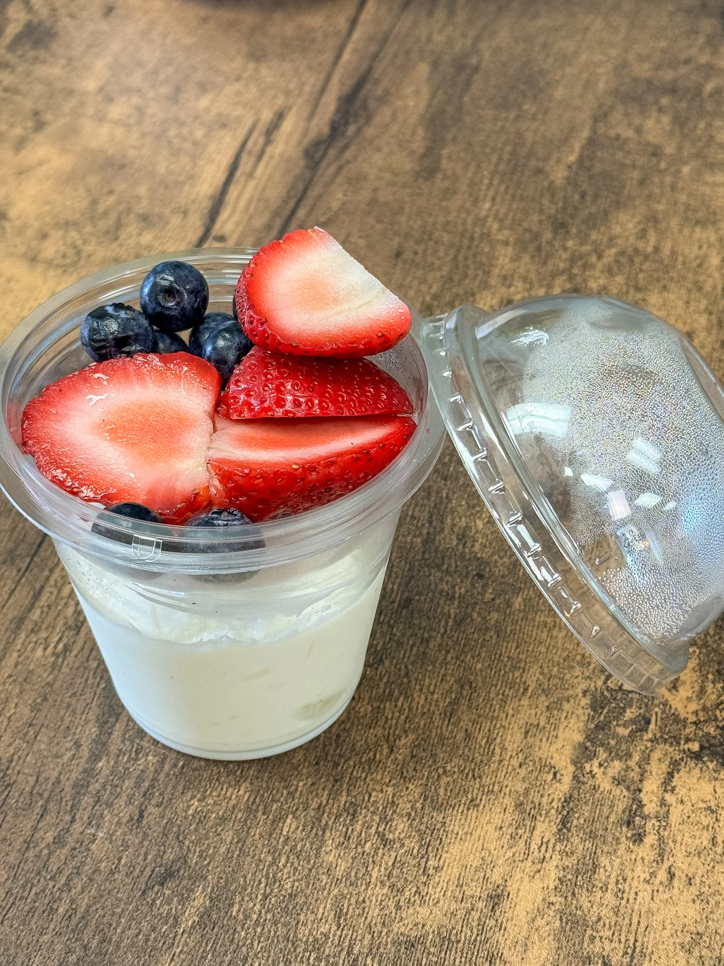 Yogurt parfait topped with fresh strawberries and blueberries served at The Soul Space café in Panama City, FL
