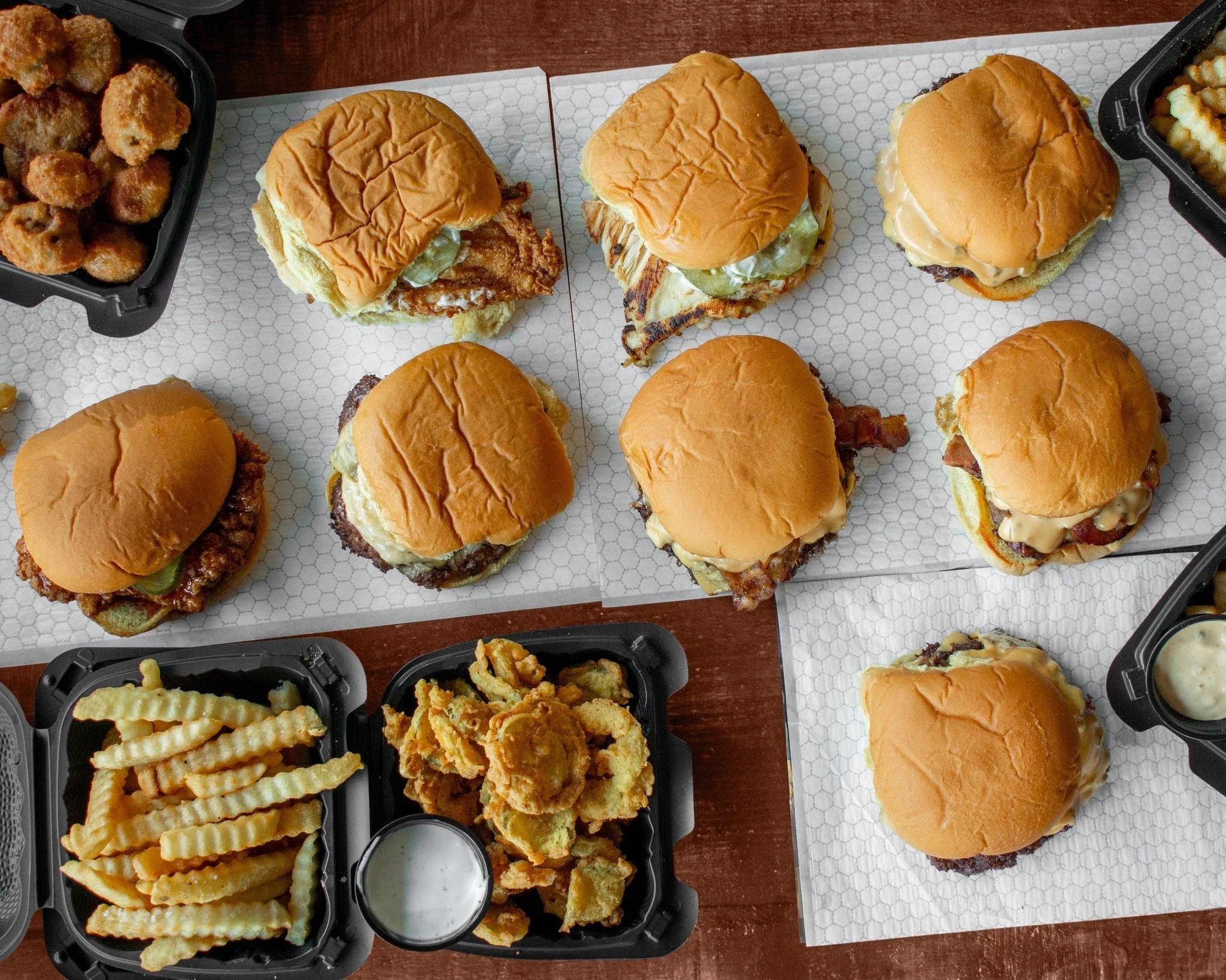Smashburgers, chicken sammiches, chicken nuggets, fried  pickles...hungry yet? Get your pub grub fix this weekend at Burgerbach's, located at @tuffysmusicbox ! #smashburgers #barfood #chickensandwich