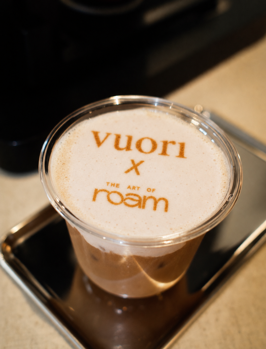 Brand activation coffee with cream top Vuori x the art of roam
