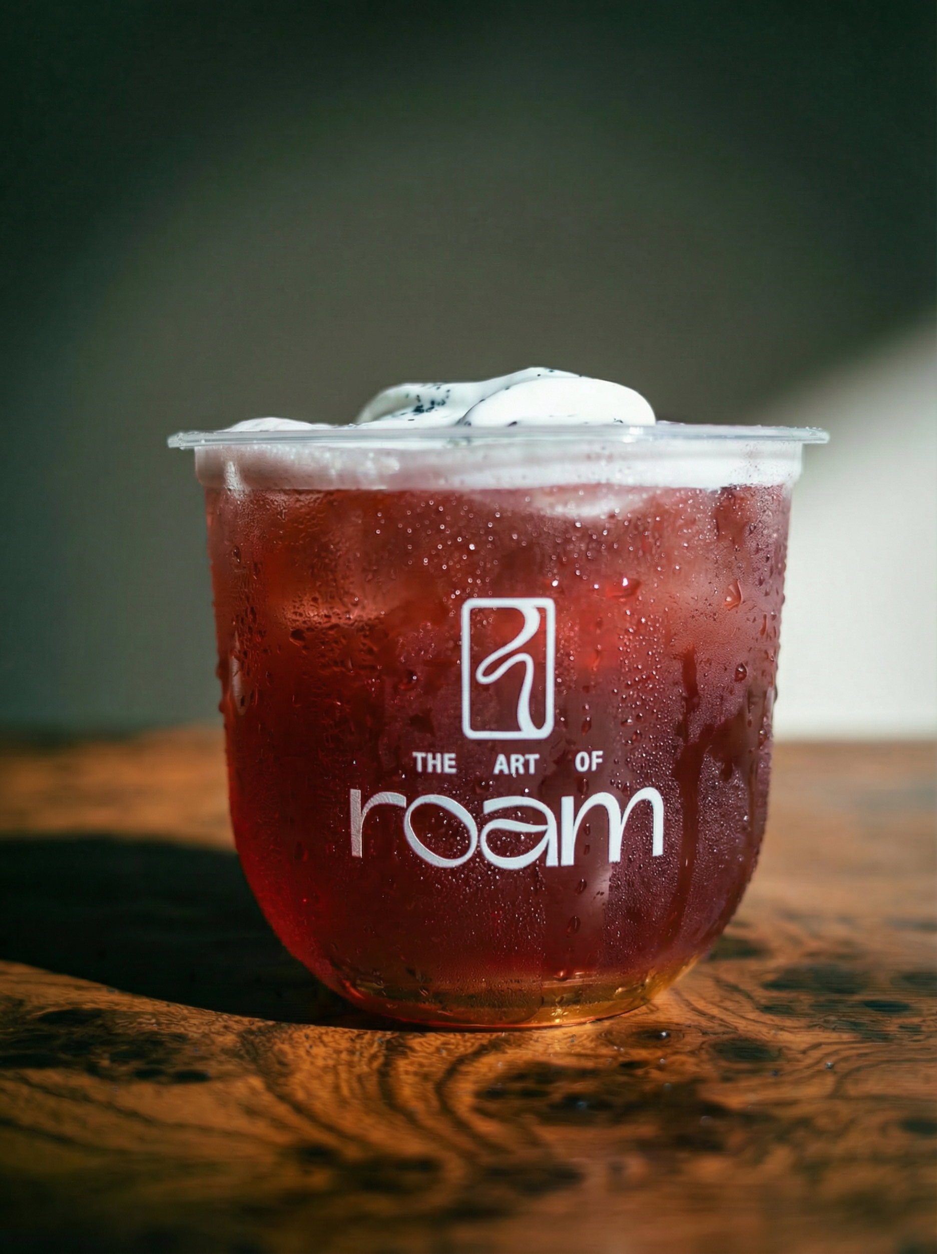 Tea-based elixir with coconut cream top served in a The Art of Roam cup
