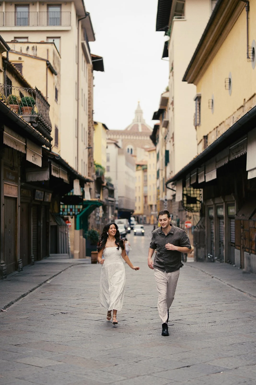 couple photoshoot on the ponte vecchio in florence, italy