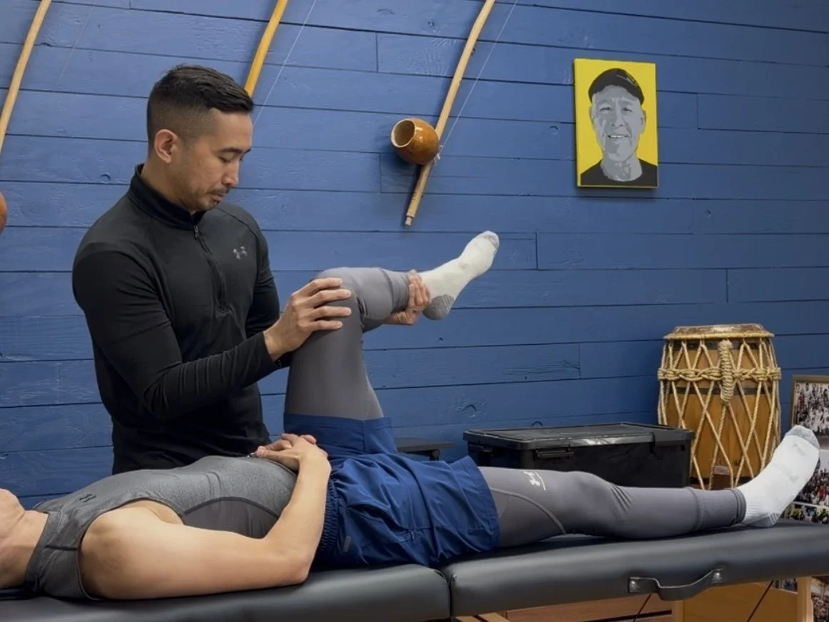 A man provides mobility assessment to a client