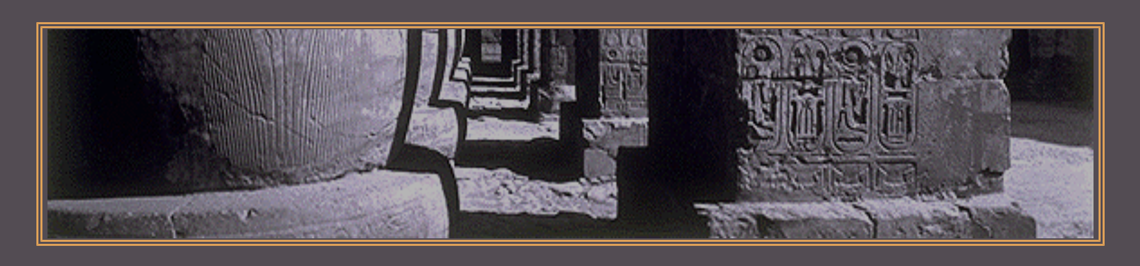 Ancient stone blocks with hieroglyphic carvings, part of an Egyptian monument or temple wall.