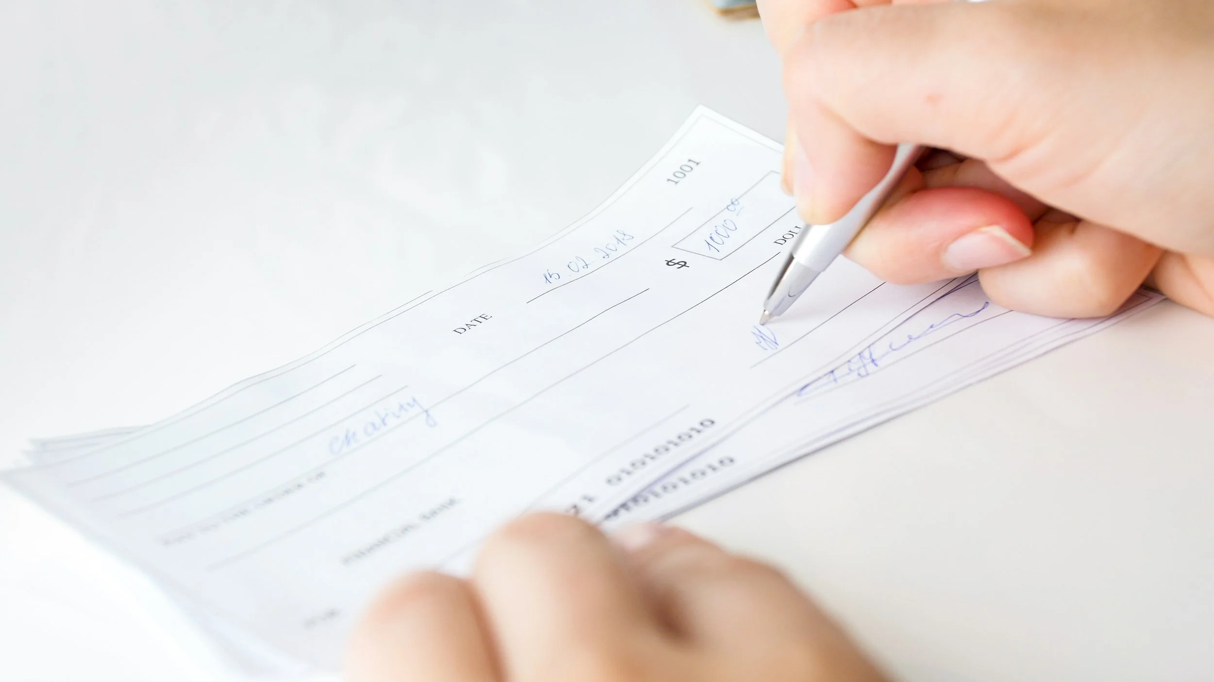 Give a gift by writing a check