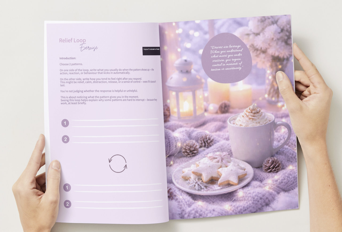 Open journal hold by a person reading the page.