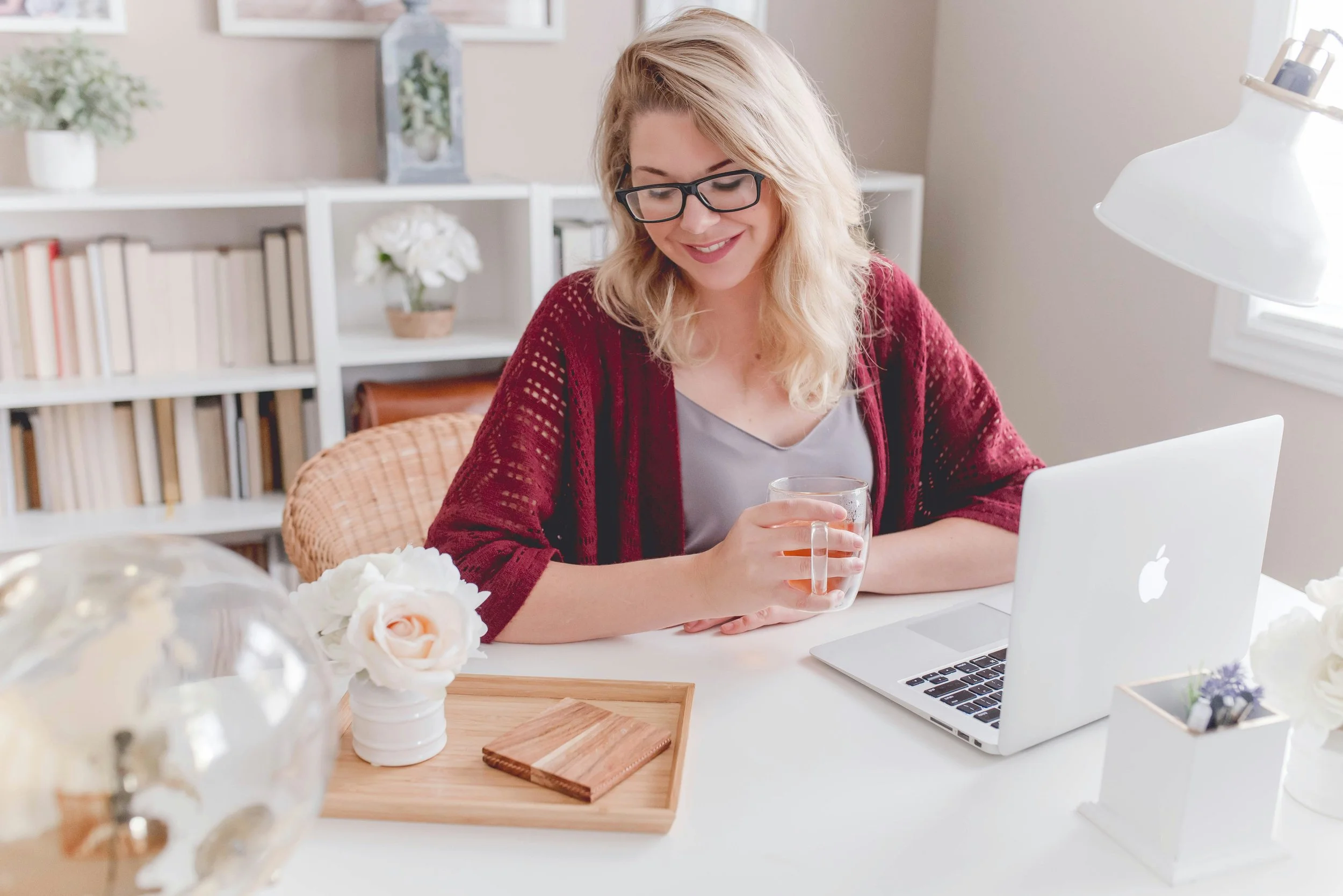 A busy virtual assistant working at her desk