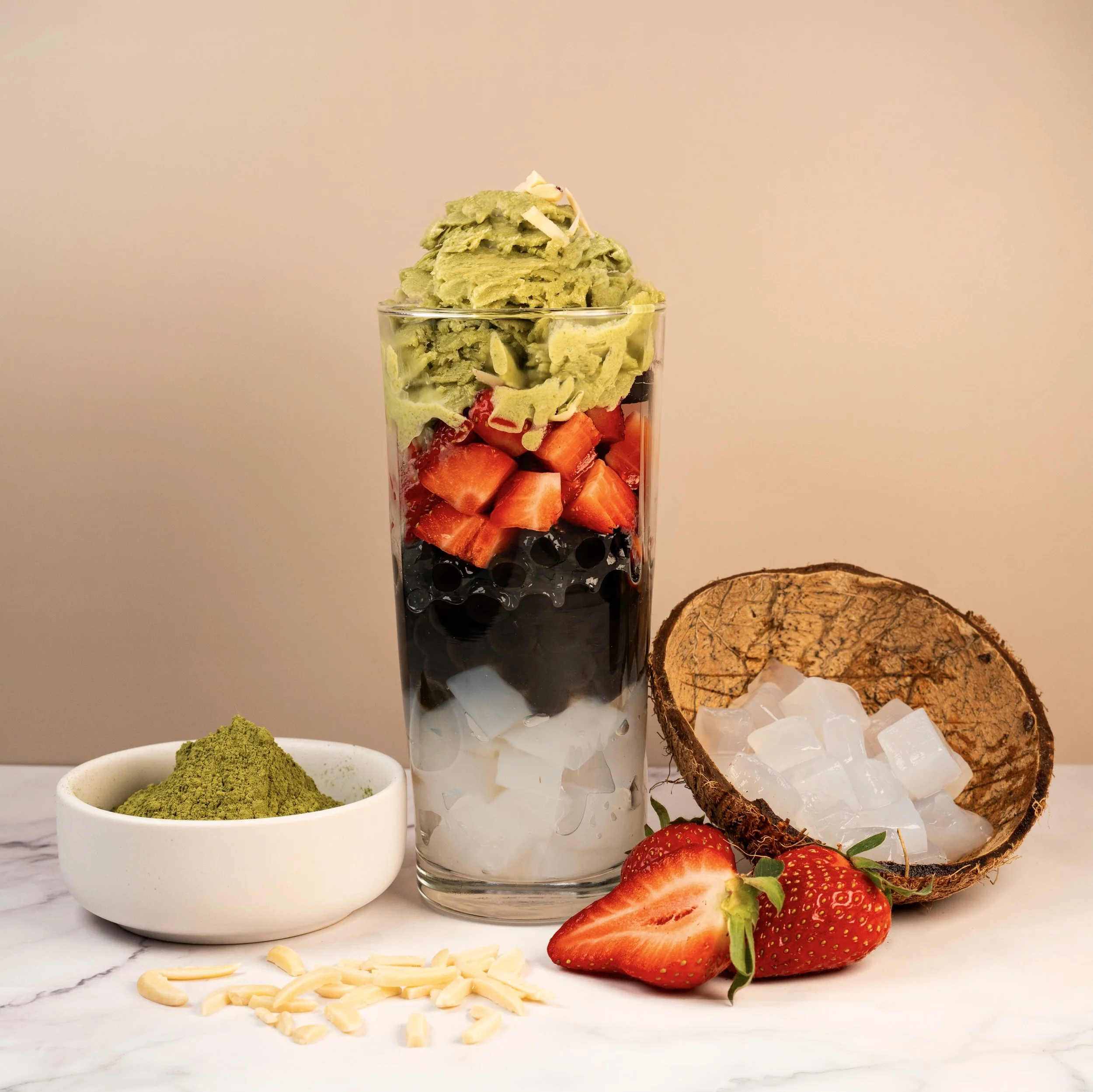 Bingsu with matcha snow, boba pearls, strawberries and red bean paste