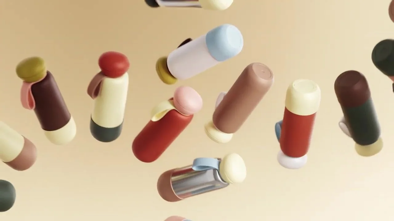 A variety of colorful pills and capsules floating against a light background.