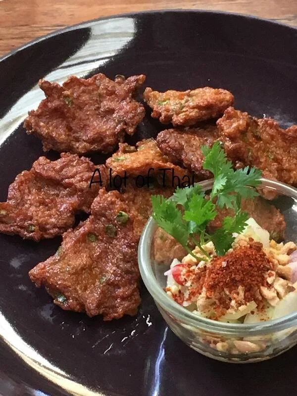 Fried curried fish cakes with cucumber sauce(relish).