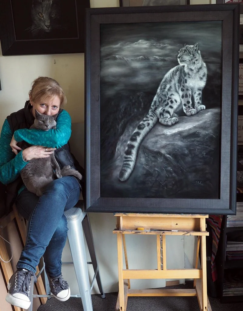 Kaz Rankin in studio, snow leopard painting, pet portrait painting, pastel, commission, pet portrait