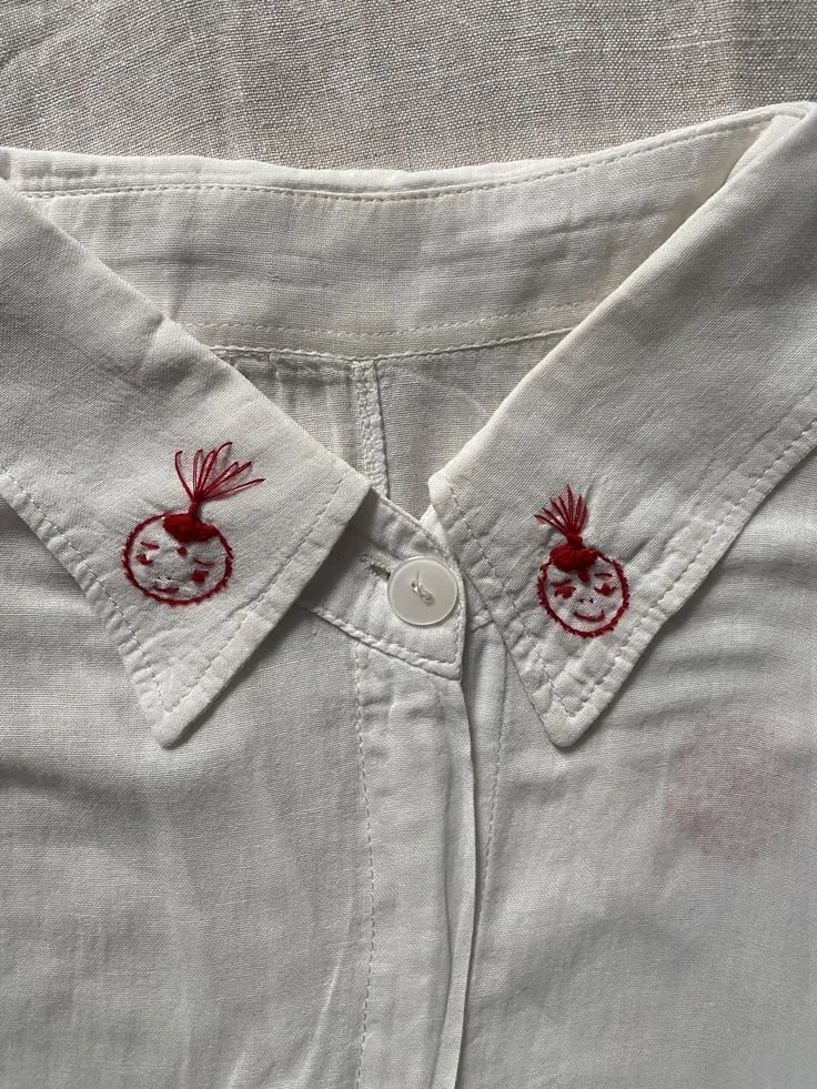 embroidery in red thread.jpg