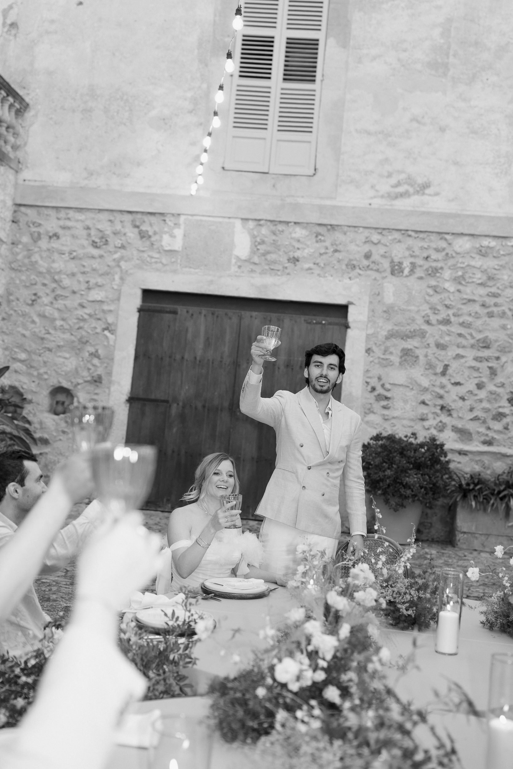 023-groom-raising-glass-son-borguet.jpg