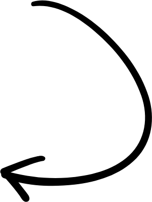 Silhouette of a person sitting on a rock by a tree, looking at the moonlit night sky.