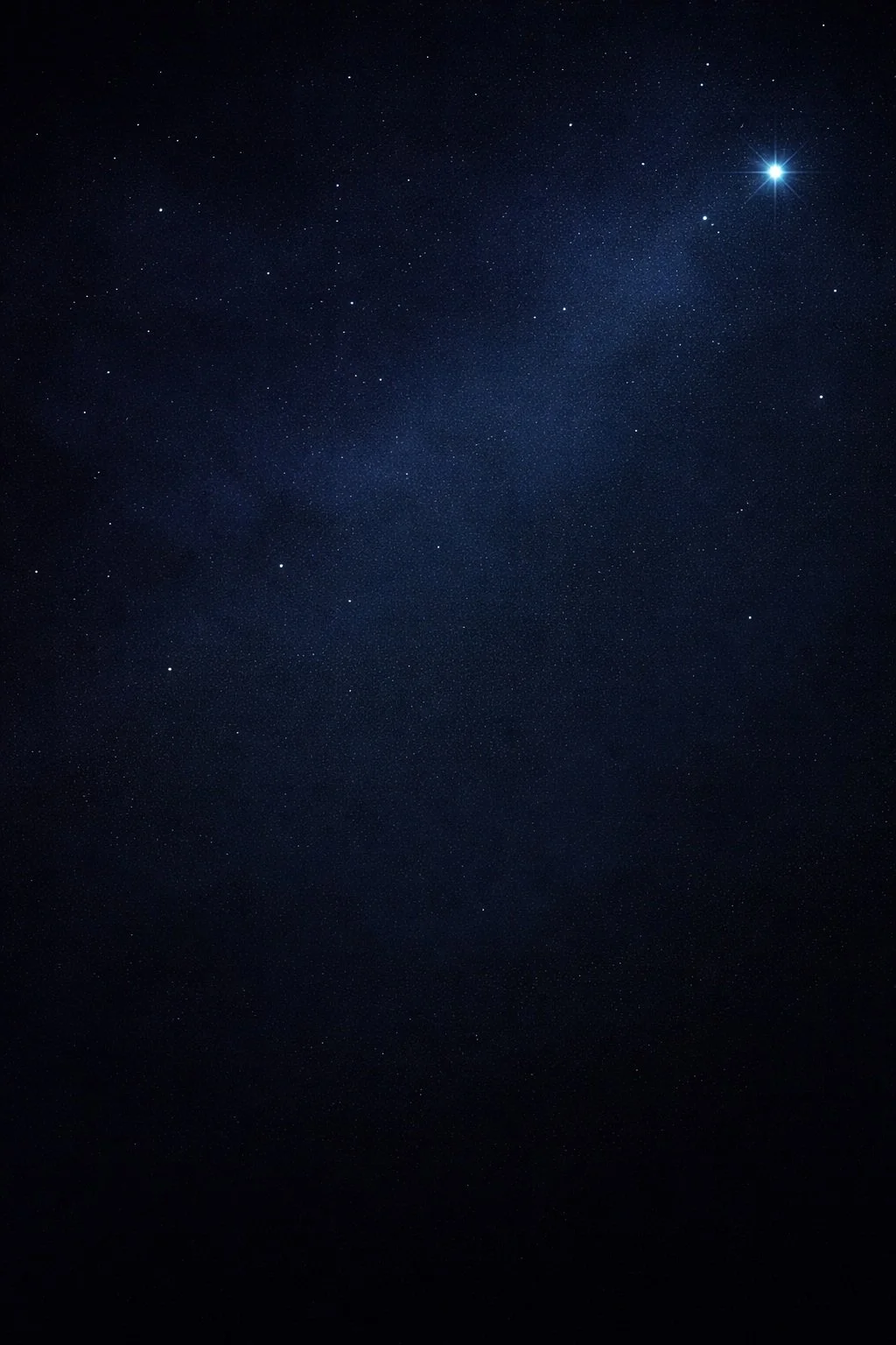 Ciel étoilé avec de nombreuses étoiles brillantes, dont une étoile très brillante dans le coin supérieur droit.