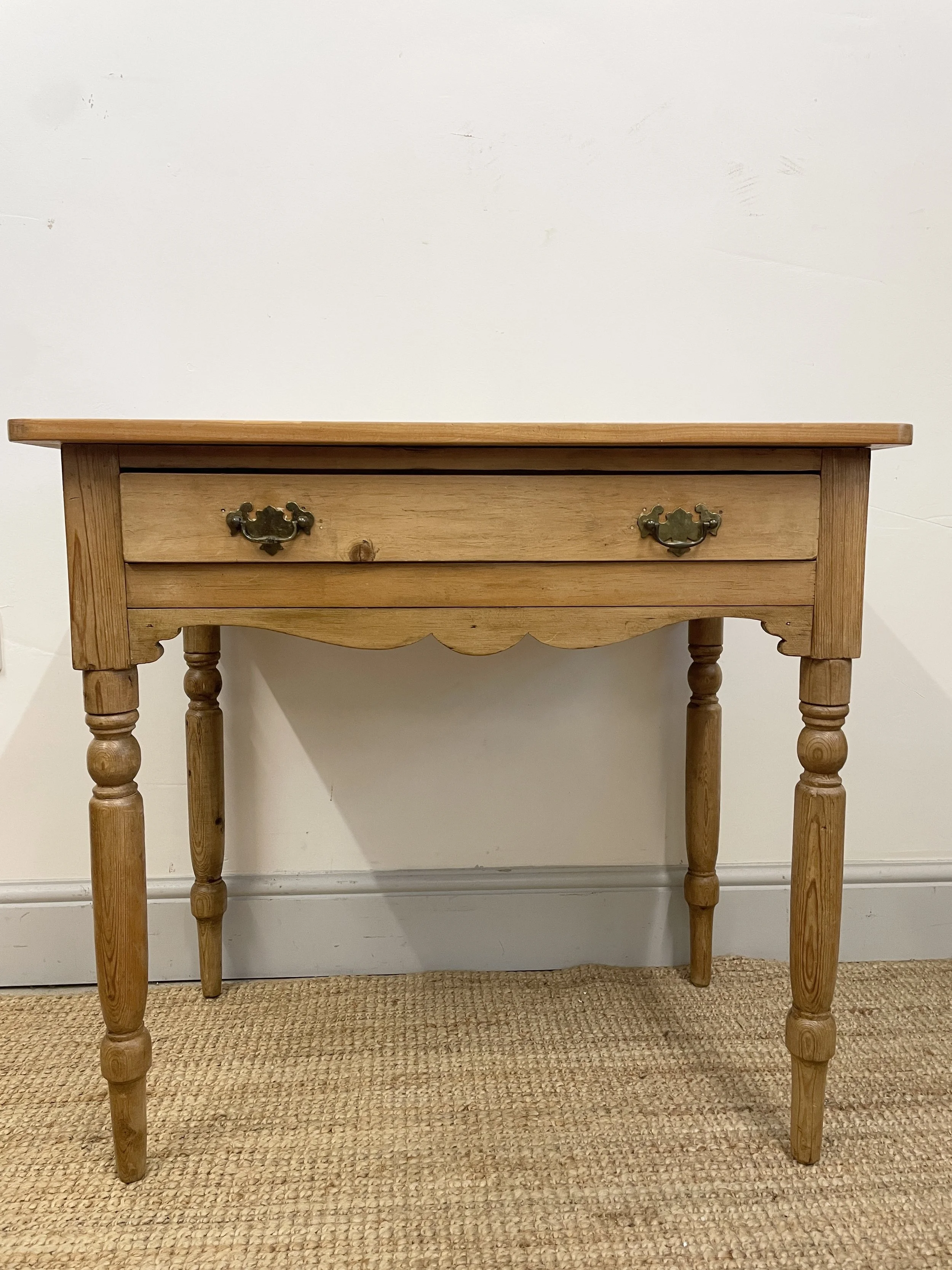 A 19th century pine side table