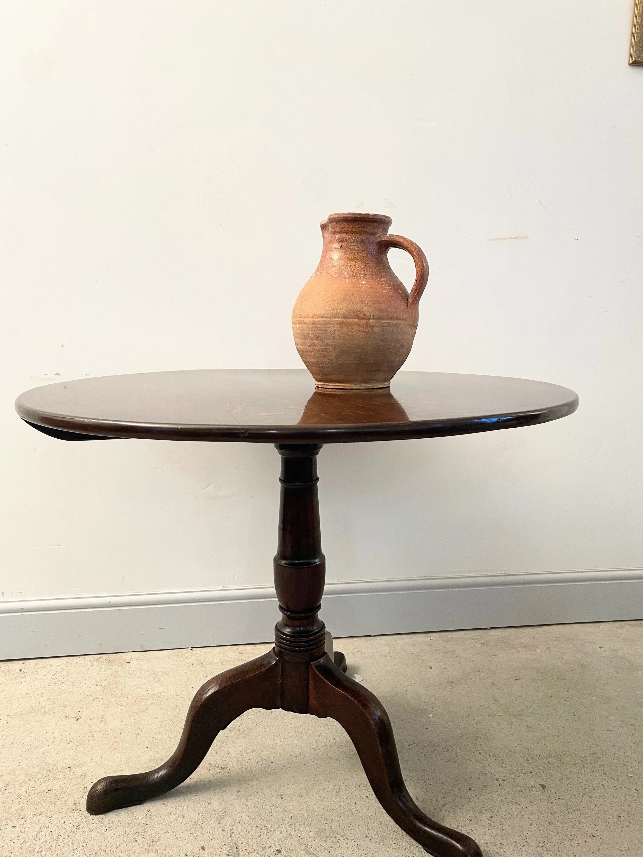 A Georgian antique oak tripod table