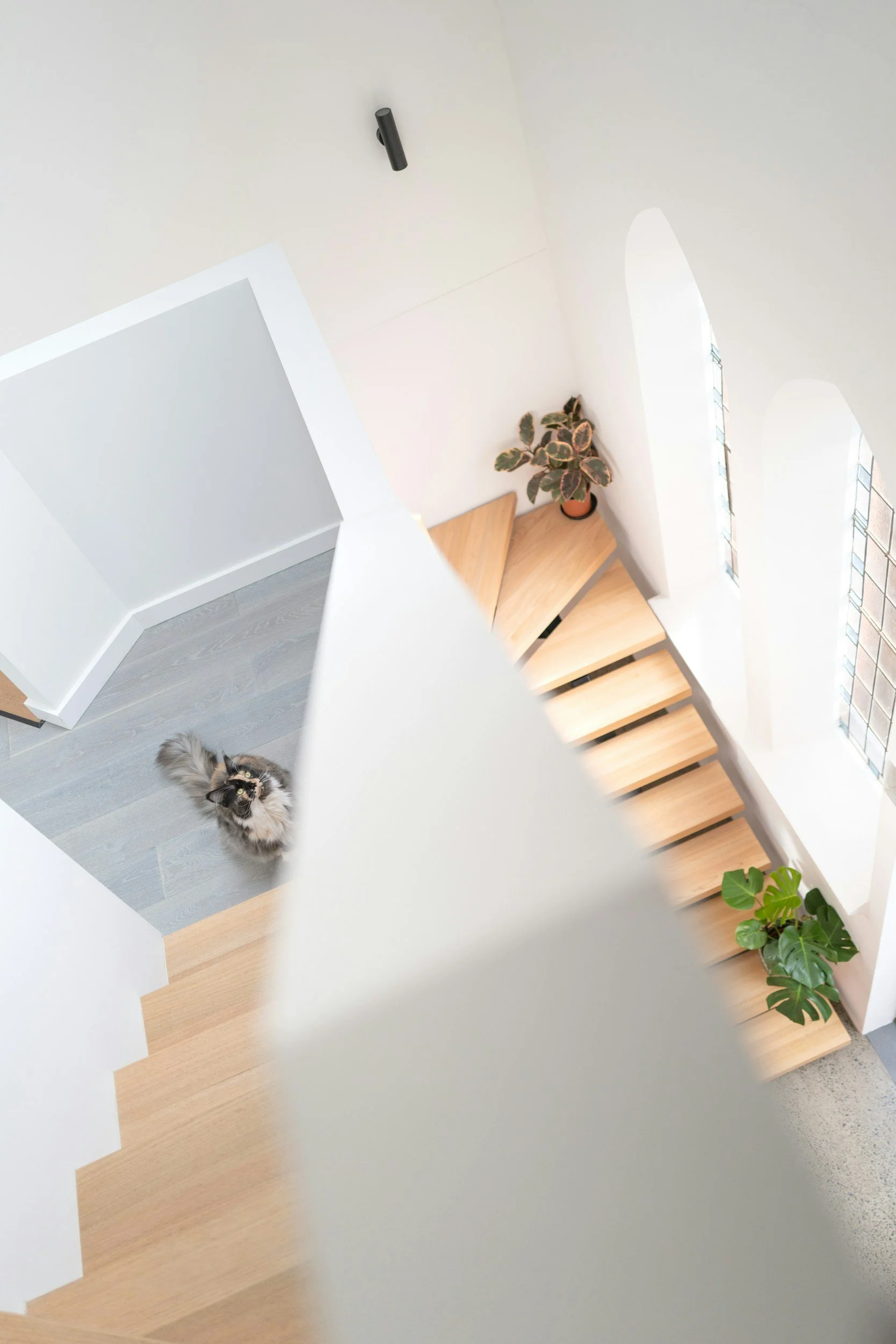 mix of a classic staircase and modern central stringer