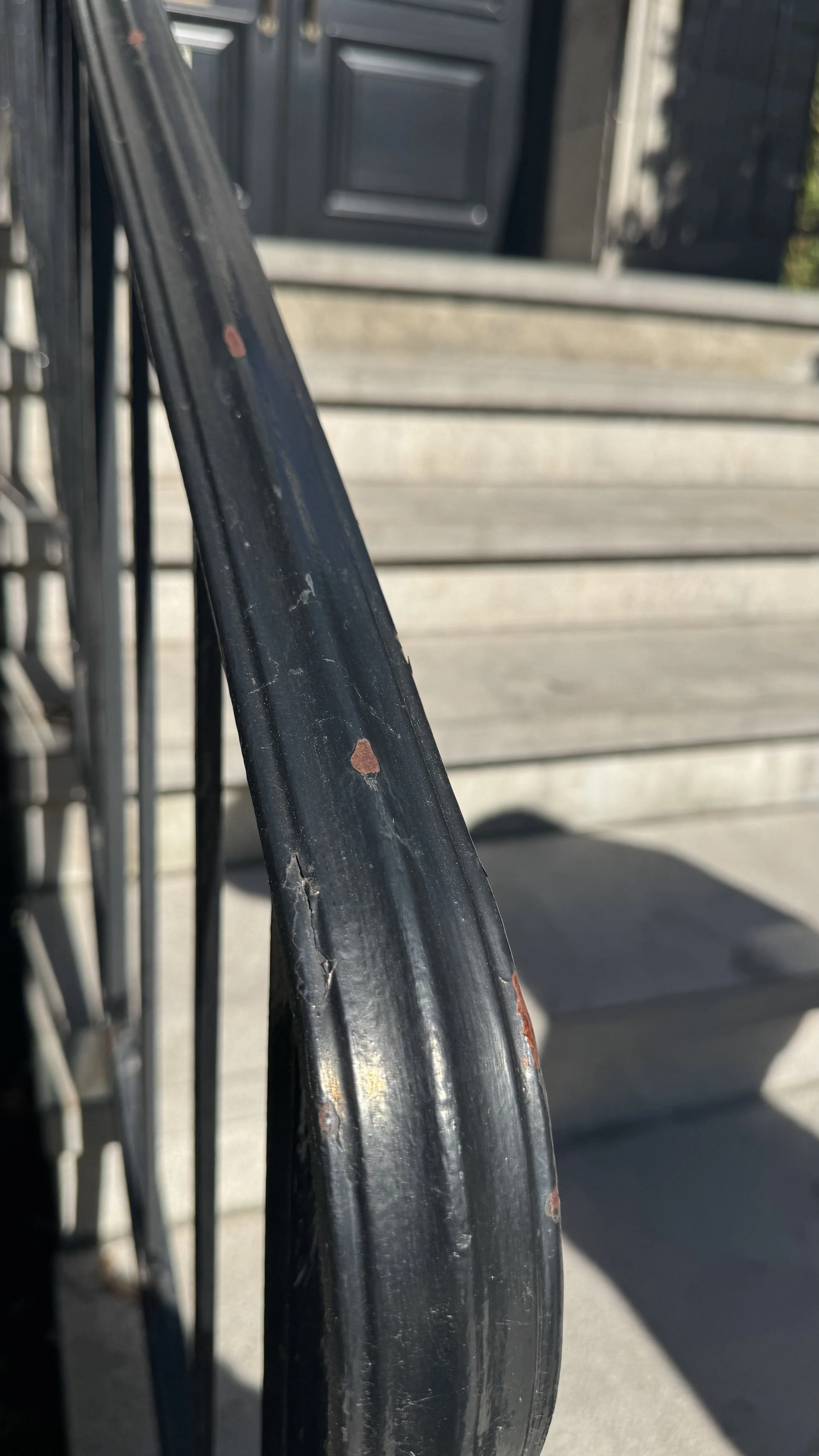 a picture of old forged steel railings that we used as inspiration for the new railings we built