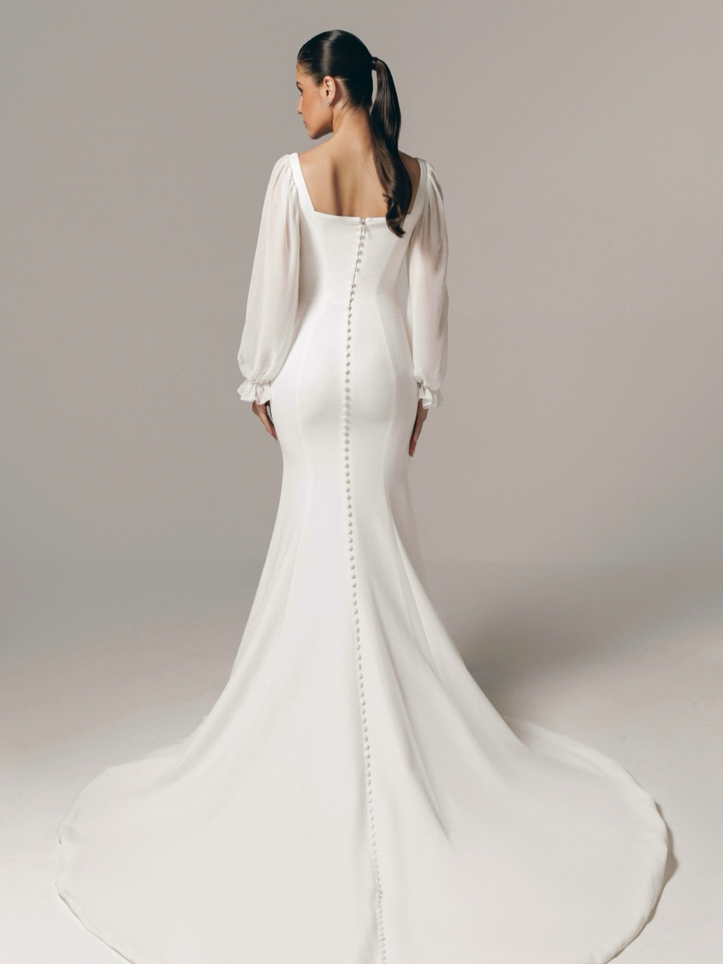 Understated yet unforgettable | #ELC04 by @elissarbridal Fitted from bust to hips, our new arrival is a stunning fit and flare silhouette with chiffon long sleeves 🤍

#simpleweddingdress #longsleeveweddingdress #bridalgown #bridetobe #2027bride #fut