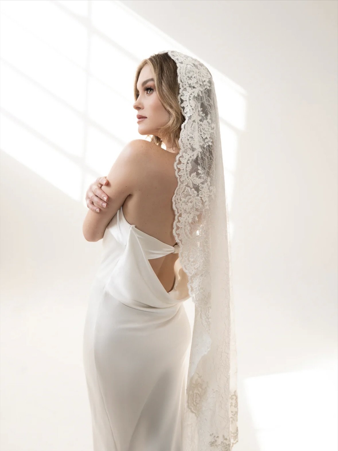 @heirloombridalcompany This mantilla-style veil is saved in our favorites folder | The delicate and lightweight alen&ccedil;on lace trim will compliment both traditional and modern wedding dresses 💌