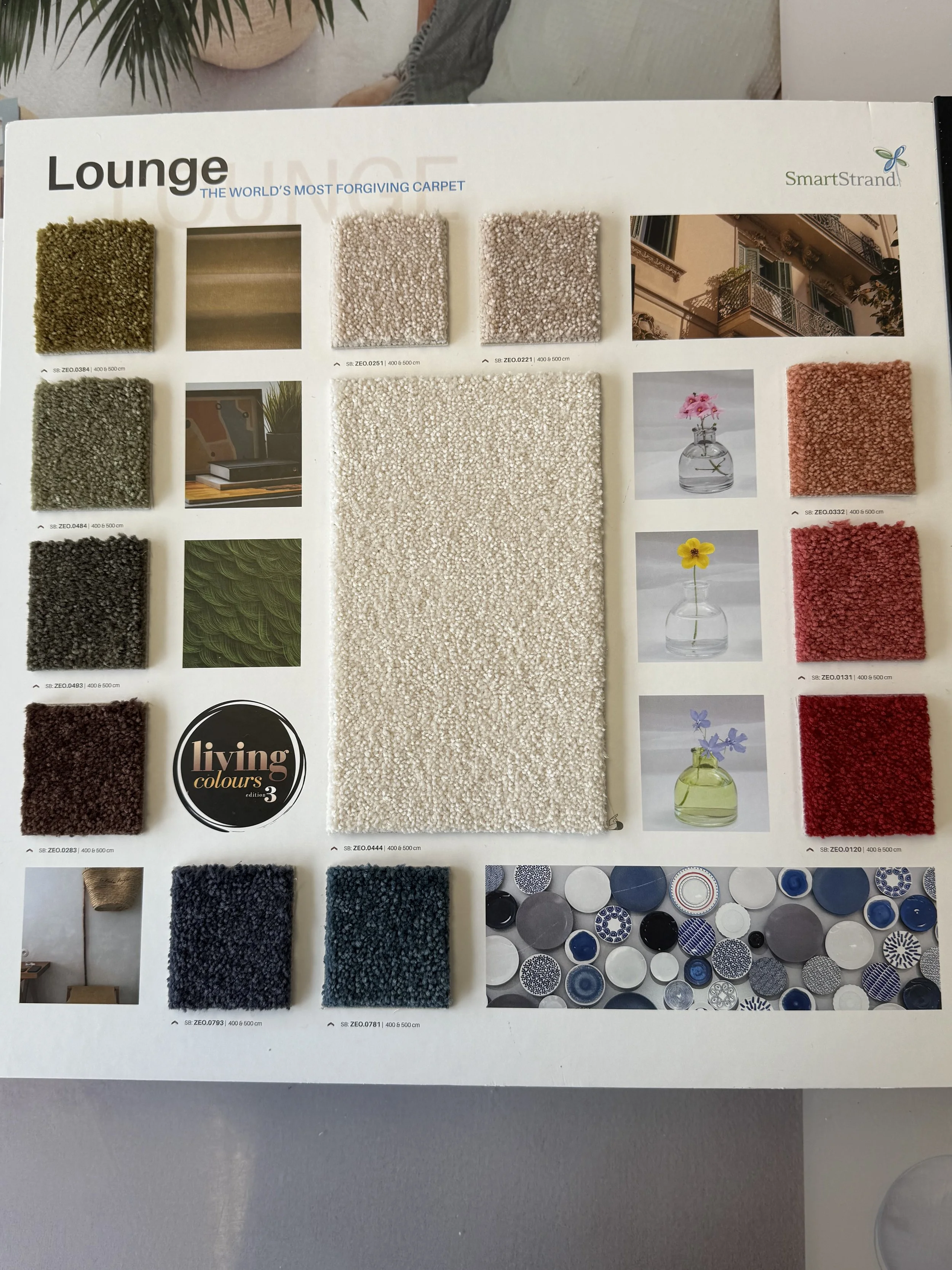 SmartStrand Carpet - Collection of carpet samples and design ideas for a lounge. Includes various colors, textures, and some decorative images of flowers, a balcony, and decorative stones.