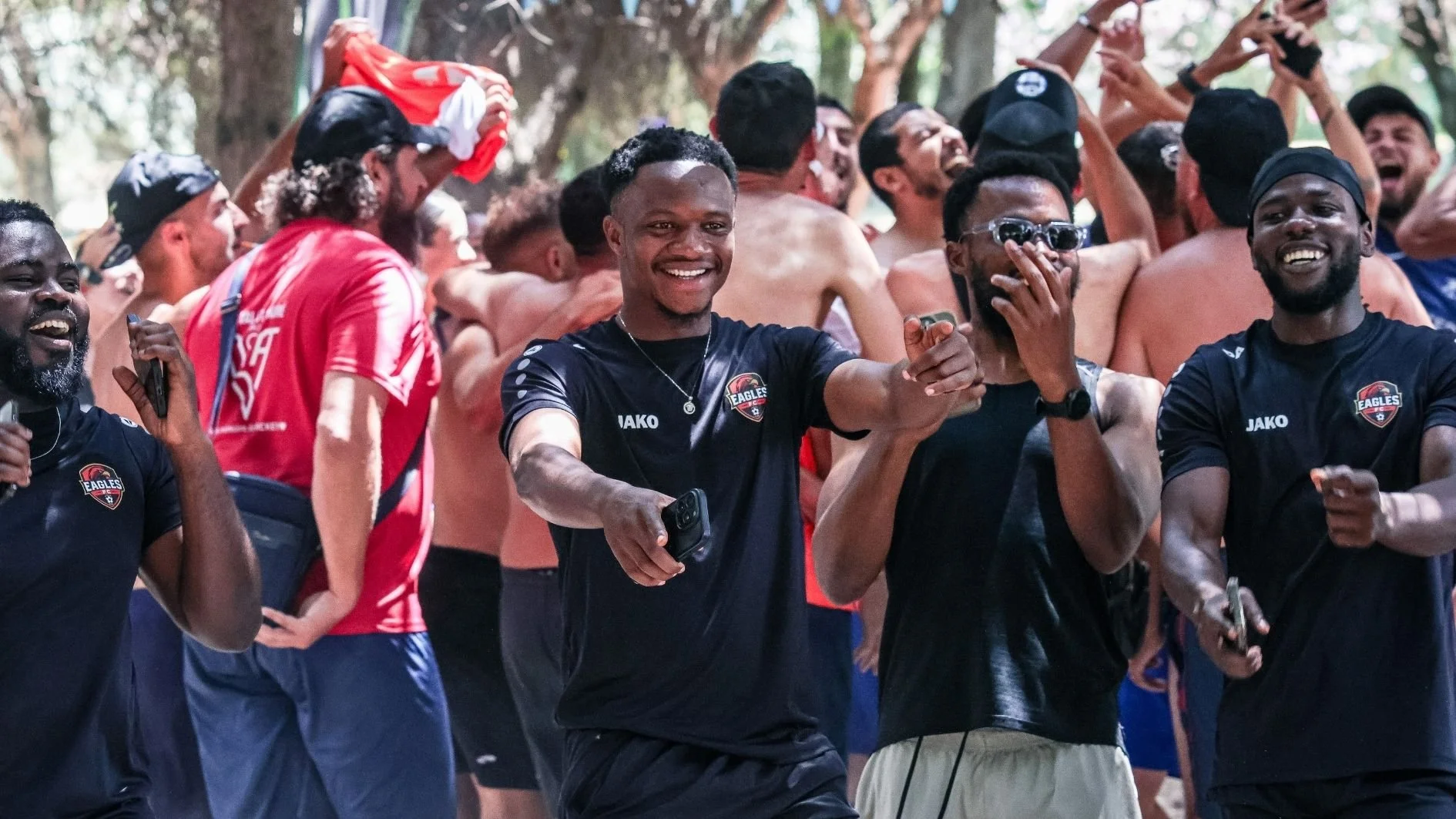 football-players-dancing-and-having-fun-at-portugal-summer-football-cup.jpg
