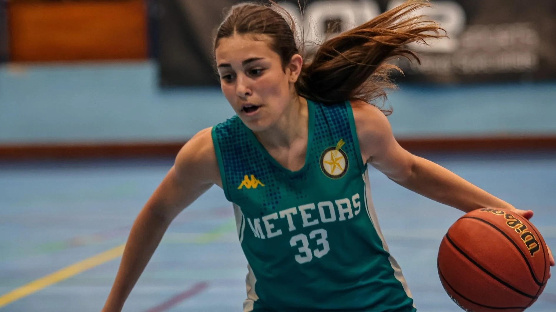 girl-basketball-player-in-game-action-at-lisbon-basketball-youth-cup.jpg