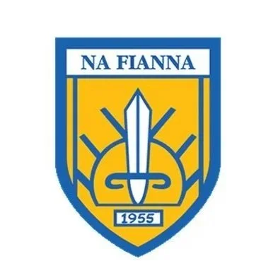 A sports team crest with a blue and yellow shield, featuring a sword and a sun, and the text 'NA FIANNA' and '1955'.