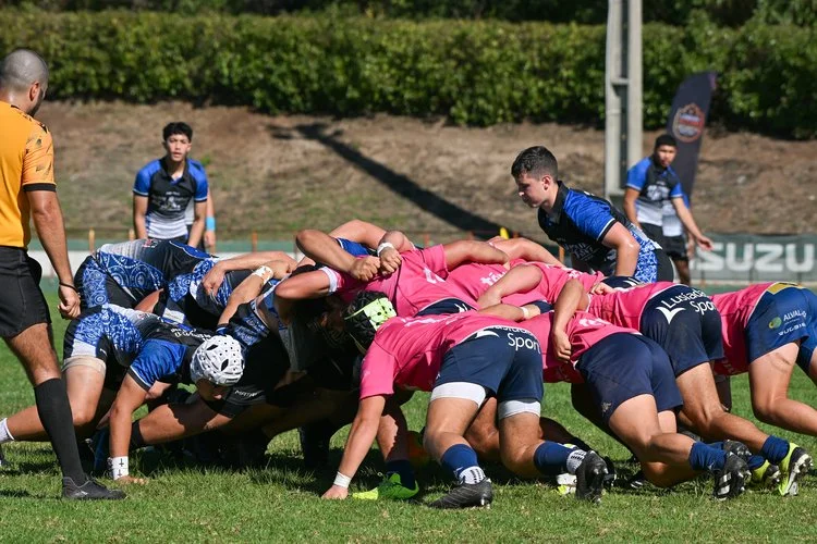 Youth rugby teams contesting a scrum during a match at the Portugal Rugby Youth Festival Autumn Series 2025.