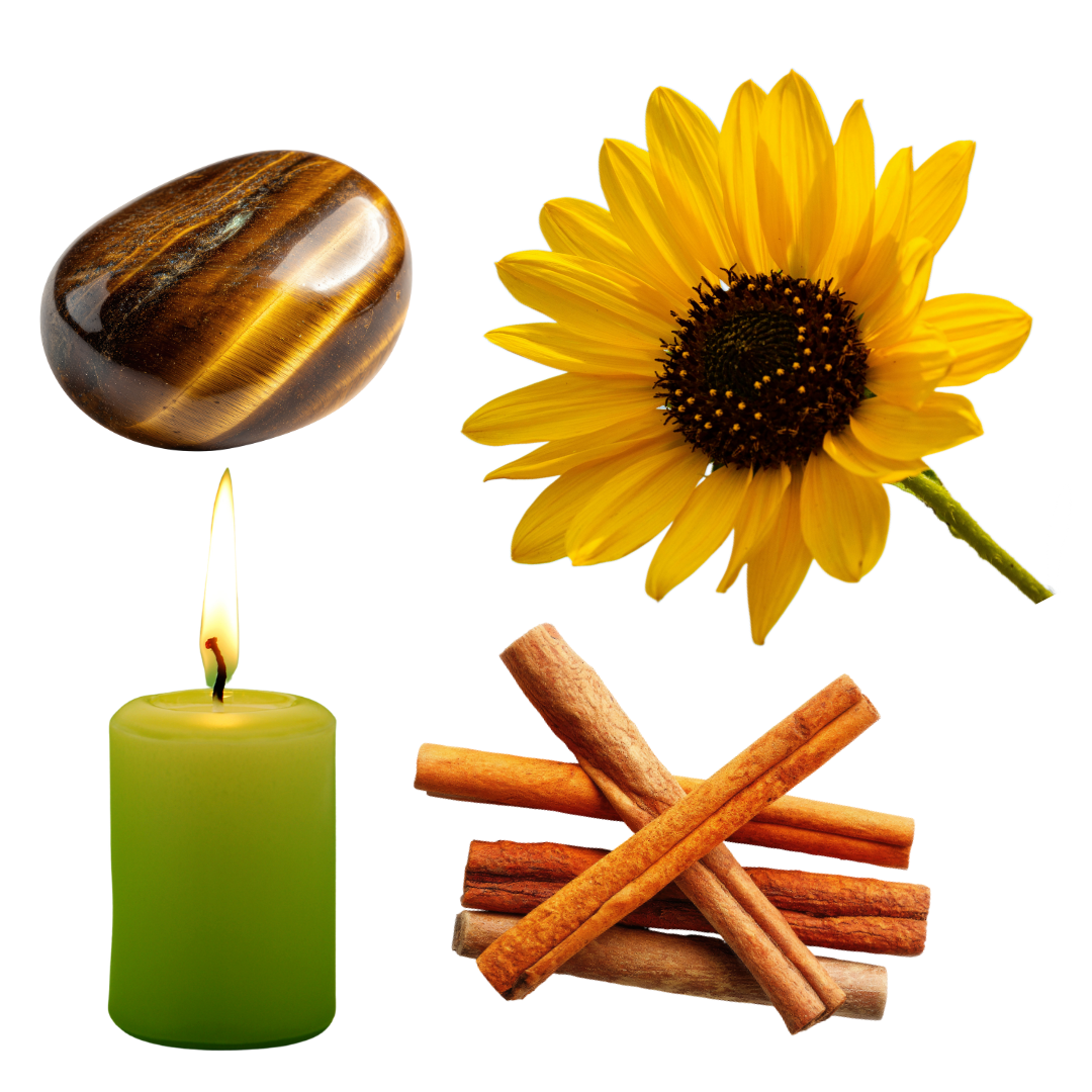 A collection of items including a sunflower, a lit green candle, cinnamon sticks, a polished tiger's eye stone, and a sunflower with yellow petals and a dark center.