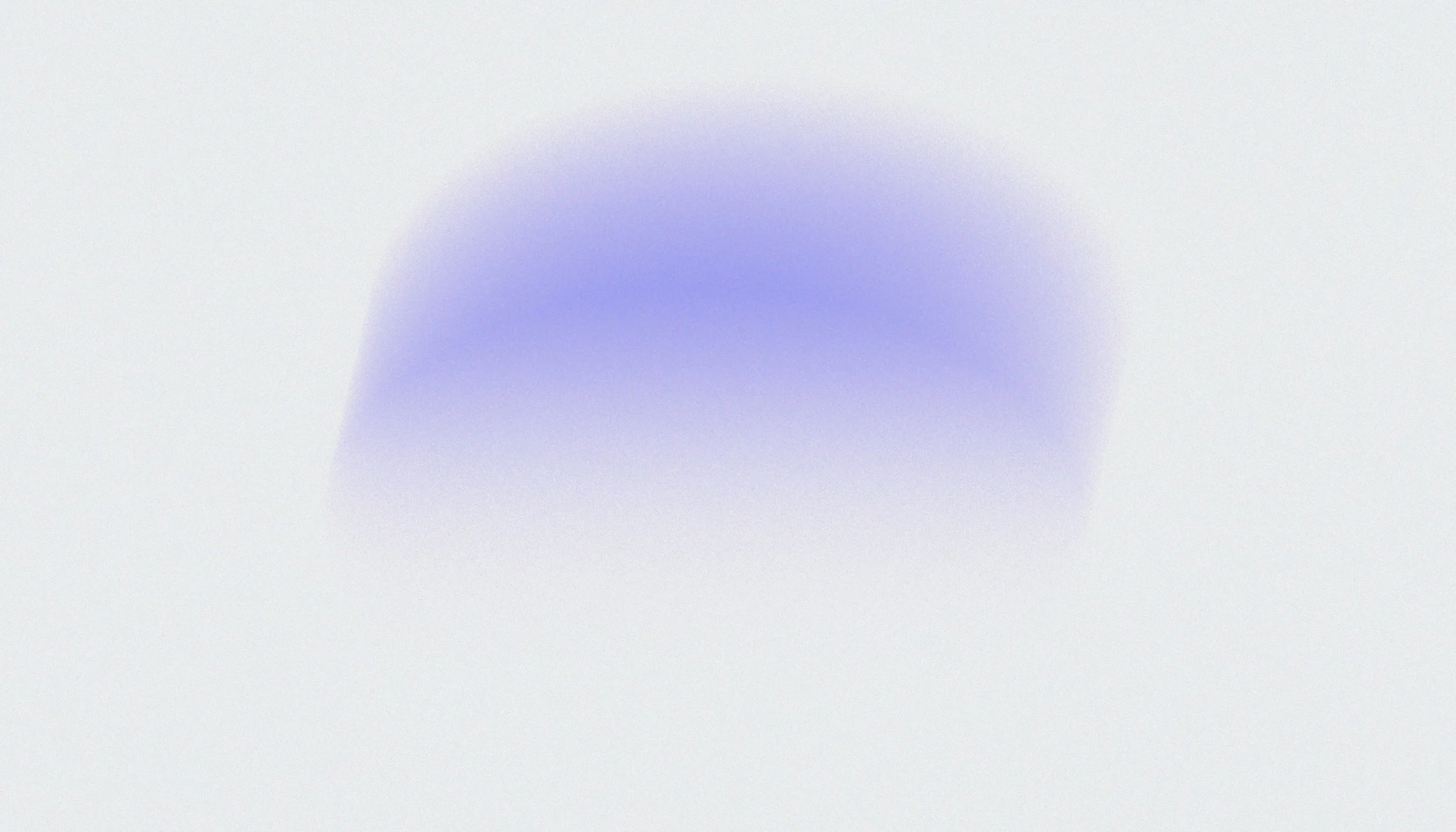 Blurred purple shape against a white background.