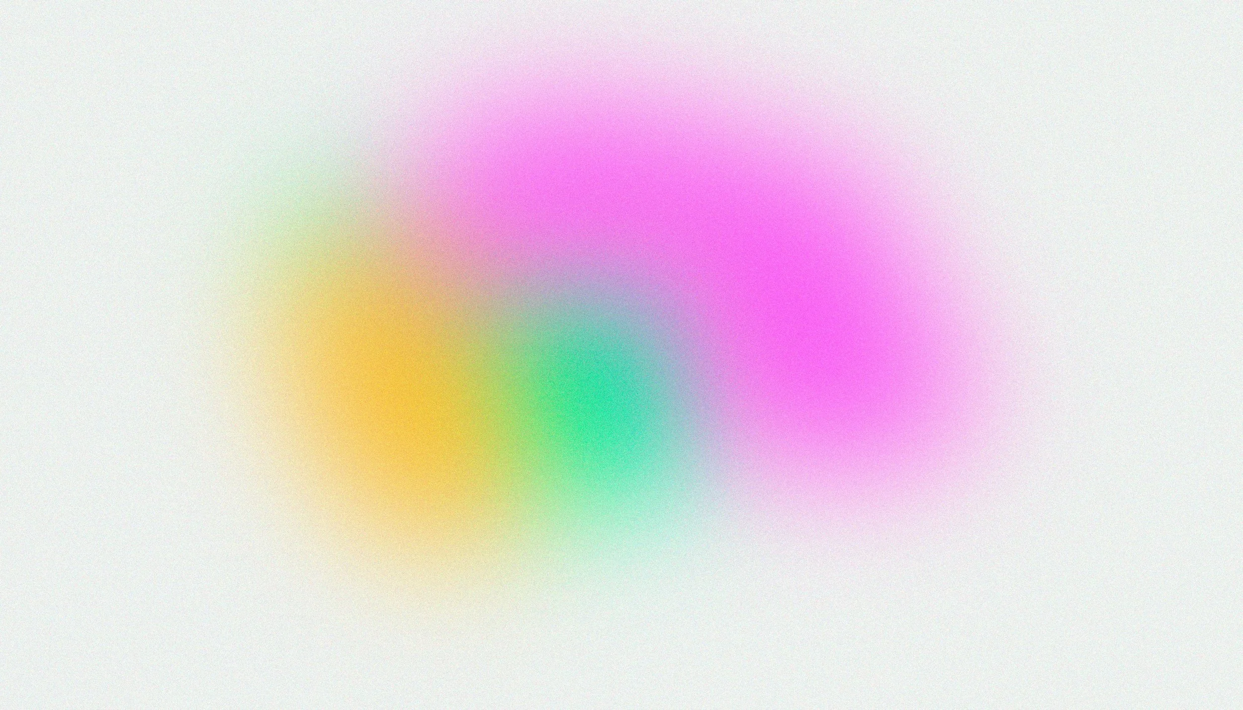 Blurred abstract background with pastel colors including pink, yellow, green, and purple.
